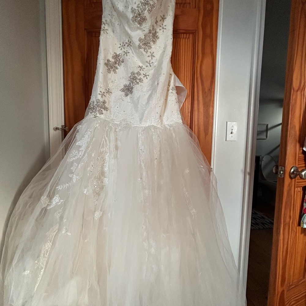 Elegant Ivory Wedding Gown with Silver Embellishments